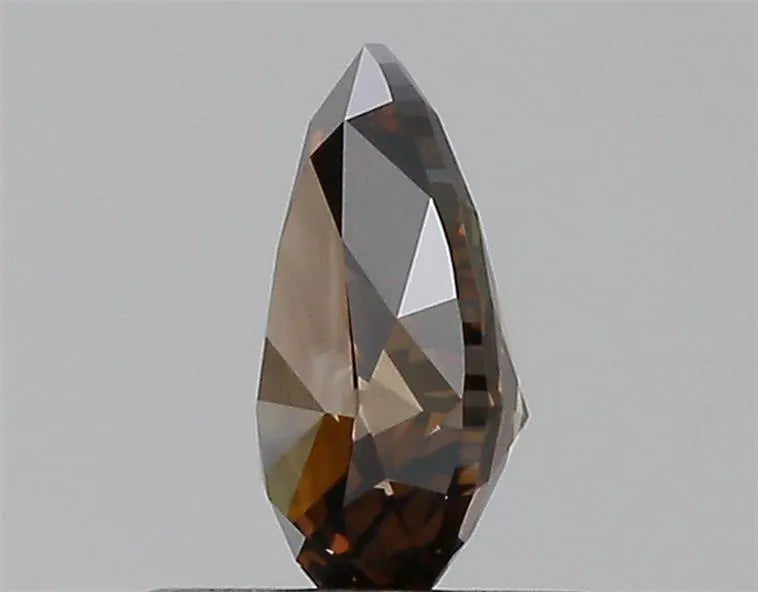 0.61ct Pear Natural Diamond (Fancy Dark Brown, Clarity VVS1, GIA)